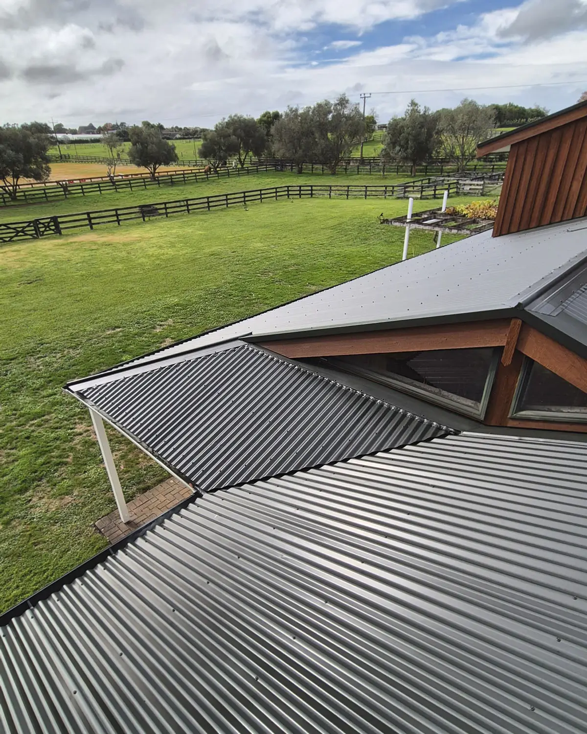 A clean, black corrugated iron roof, with beautiful, new paint